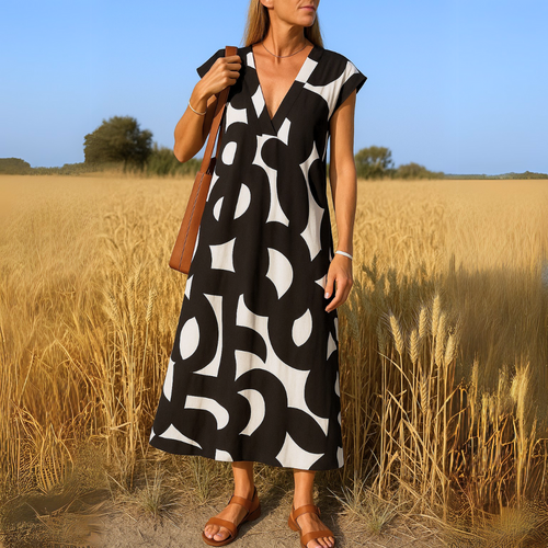 Amina™ Jurk – Zomerse Vrijheid met Grafische Print